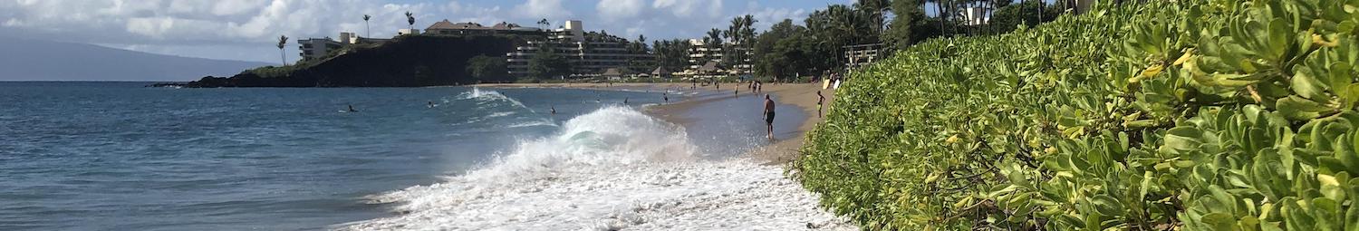 Region: Kaanapali South, Maui, Hawaii. Location: By Whaler looking towards Black Rock, Sheraton Hotel!. Observations: High surf flooded sidewalk! Plastic barriers were up! 20 minutes after high point!